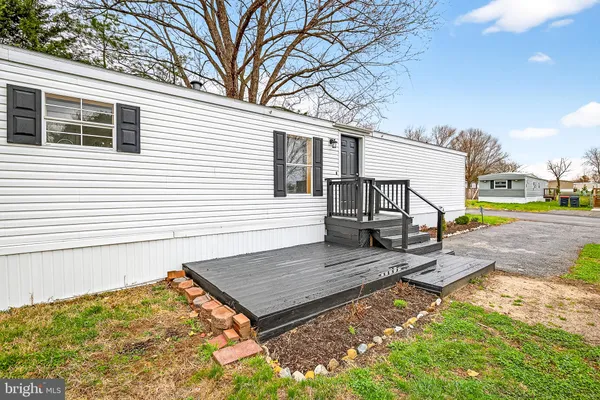 a house view with a backyard space