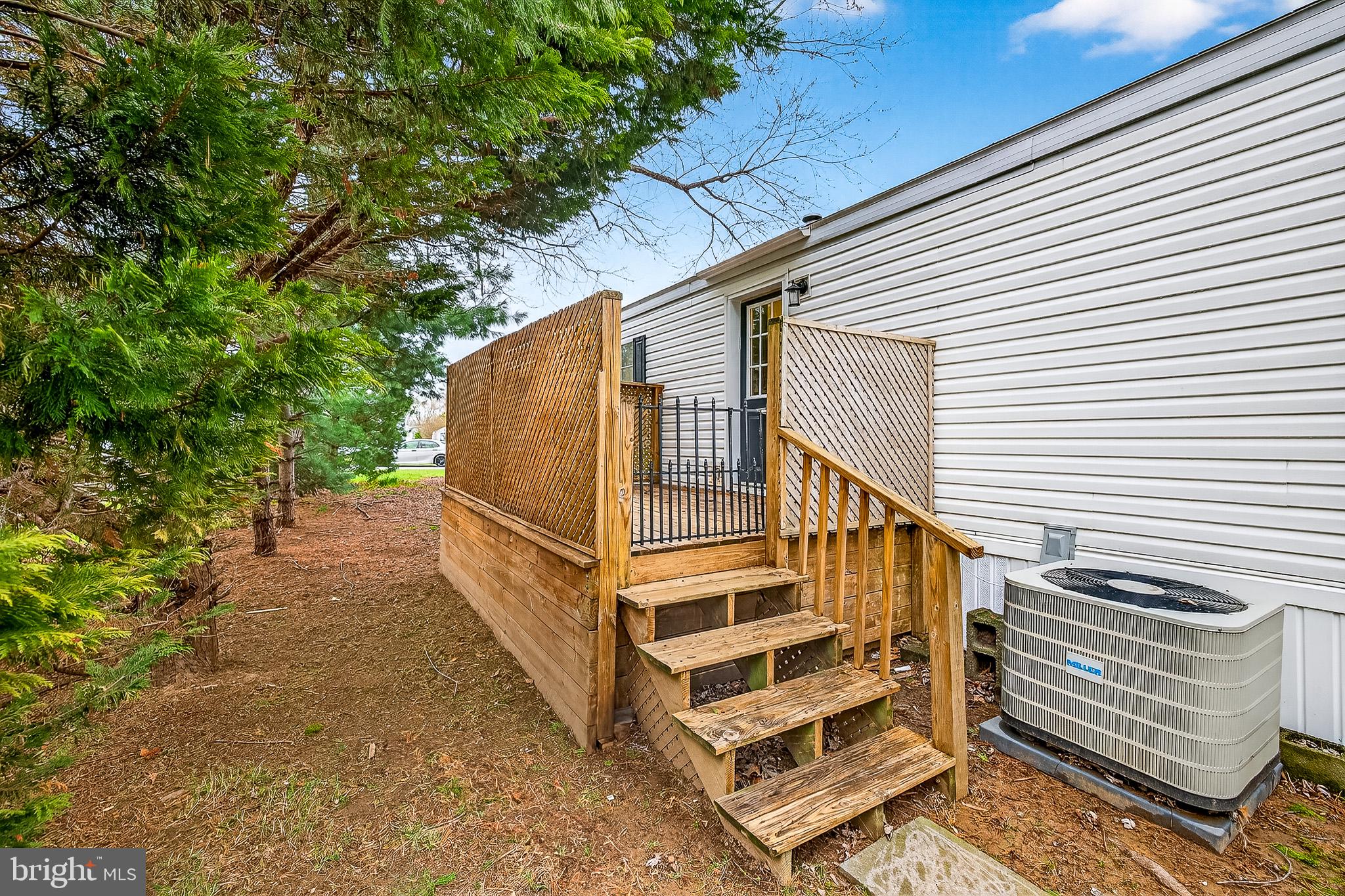 126 Boxwood Road, Unit 126 Middletown, DE 19709 - Photo 30 of 33 Charming entryway with natural surroundings.