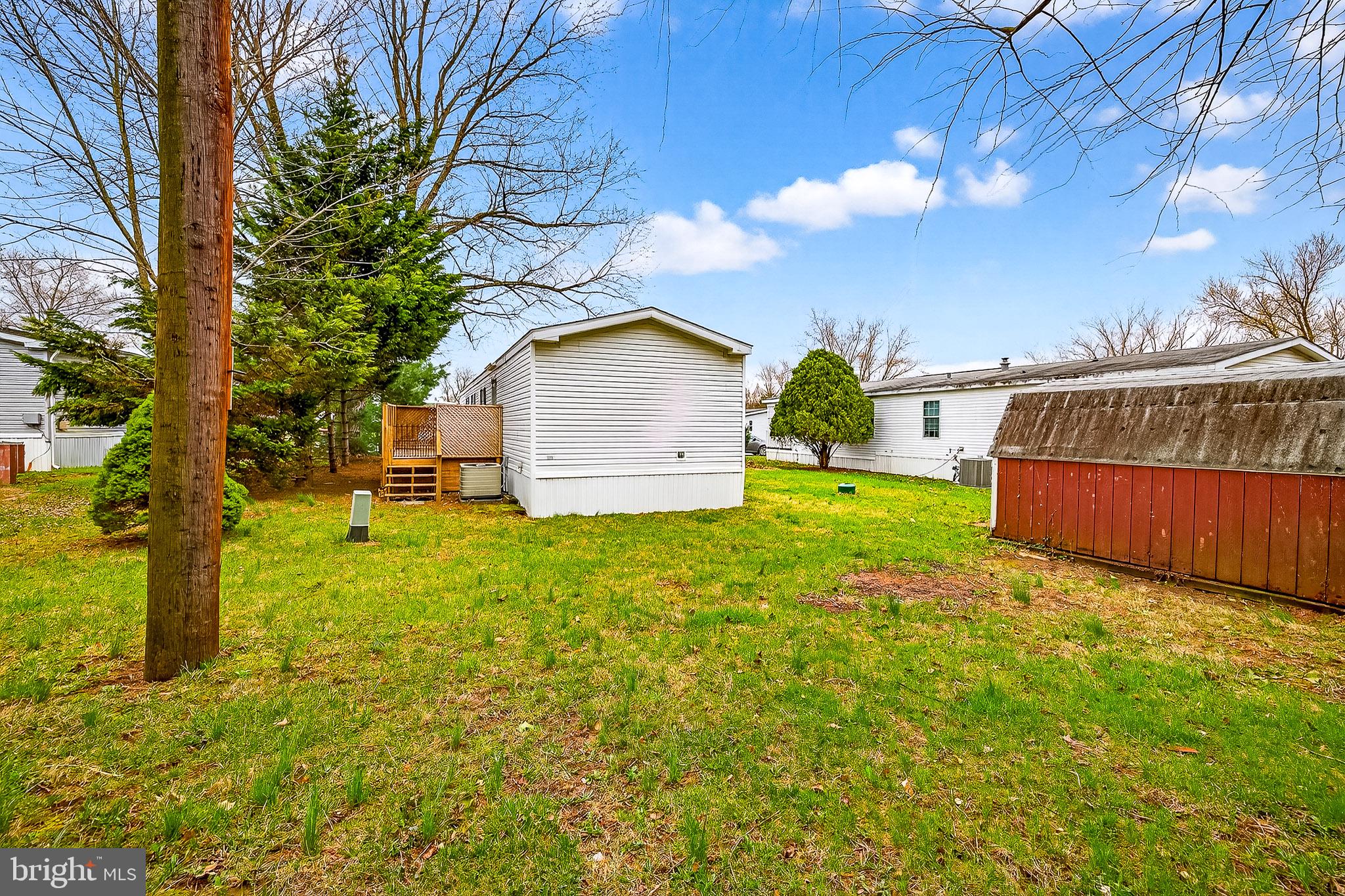 126 Boxwood Road, Unit 126 Middletown, DE 19709 - Photo 31 of 33 Spacious yard with serene surroundings.