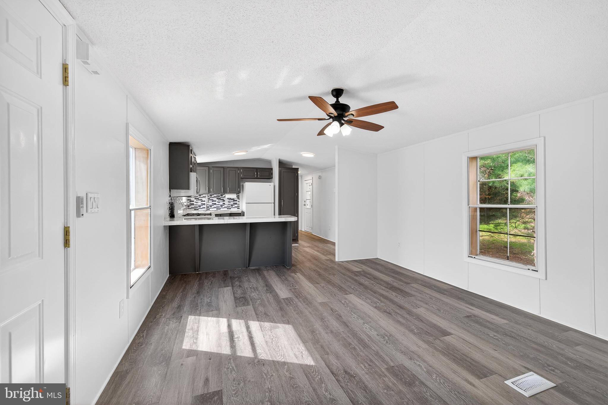 126 Boxwood Road, Unit 126 Middletown, DE 19709 - Photo 6 of 33 Bright and airy open living space.