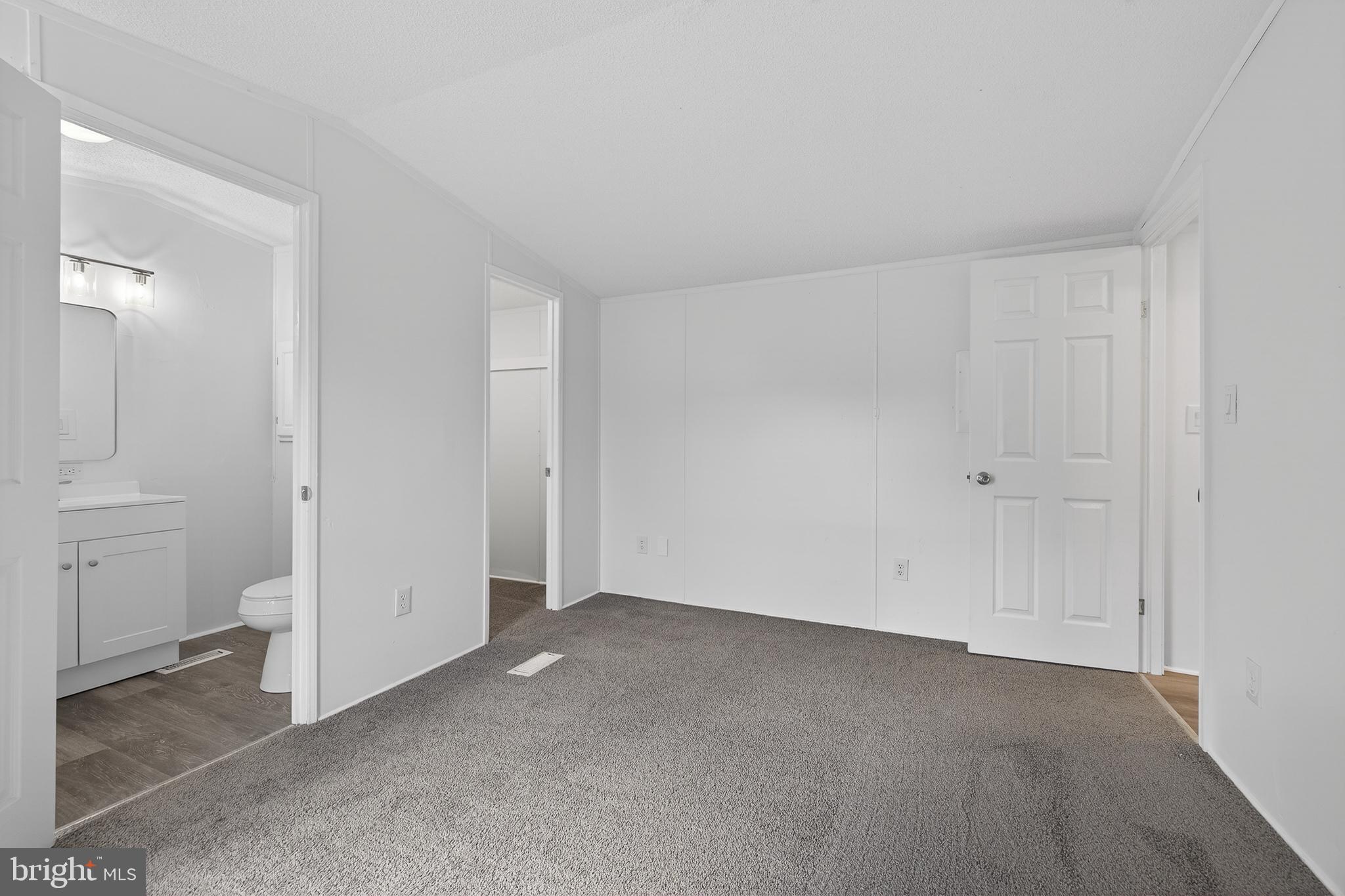 126 Boxwood Road, Unit 126 Middletown, DE 19709 - Photo 9 of 33 Spacious, versatile living area awaits.