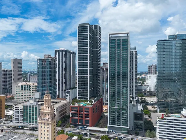 a front view of a city with tall buildings
