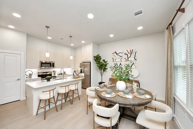 a view of a street with a yard