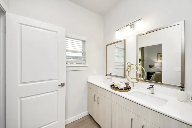 a bedroom with a bed and a couch