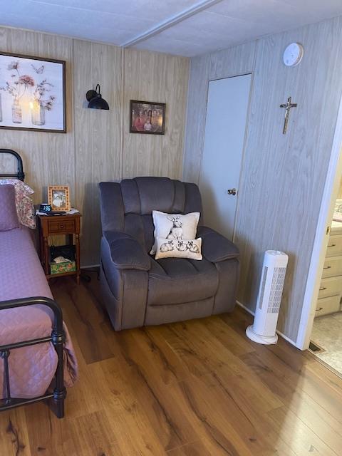 4125 Mchenry Avenue, Unit 35 Modesto, CA 95356 - Photo 13 of 20 a living room with furniture and a wooden floor