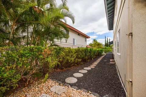 a view of a swimming pool with a table and chairs