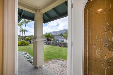 a view of a porch with a yard
