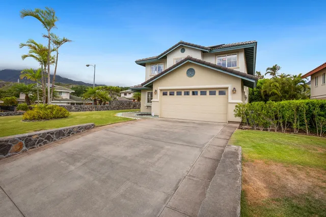 a view of a house with a swimming pool and a porch