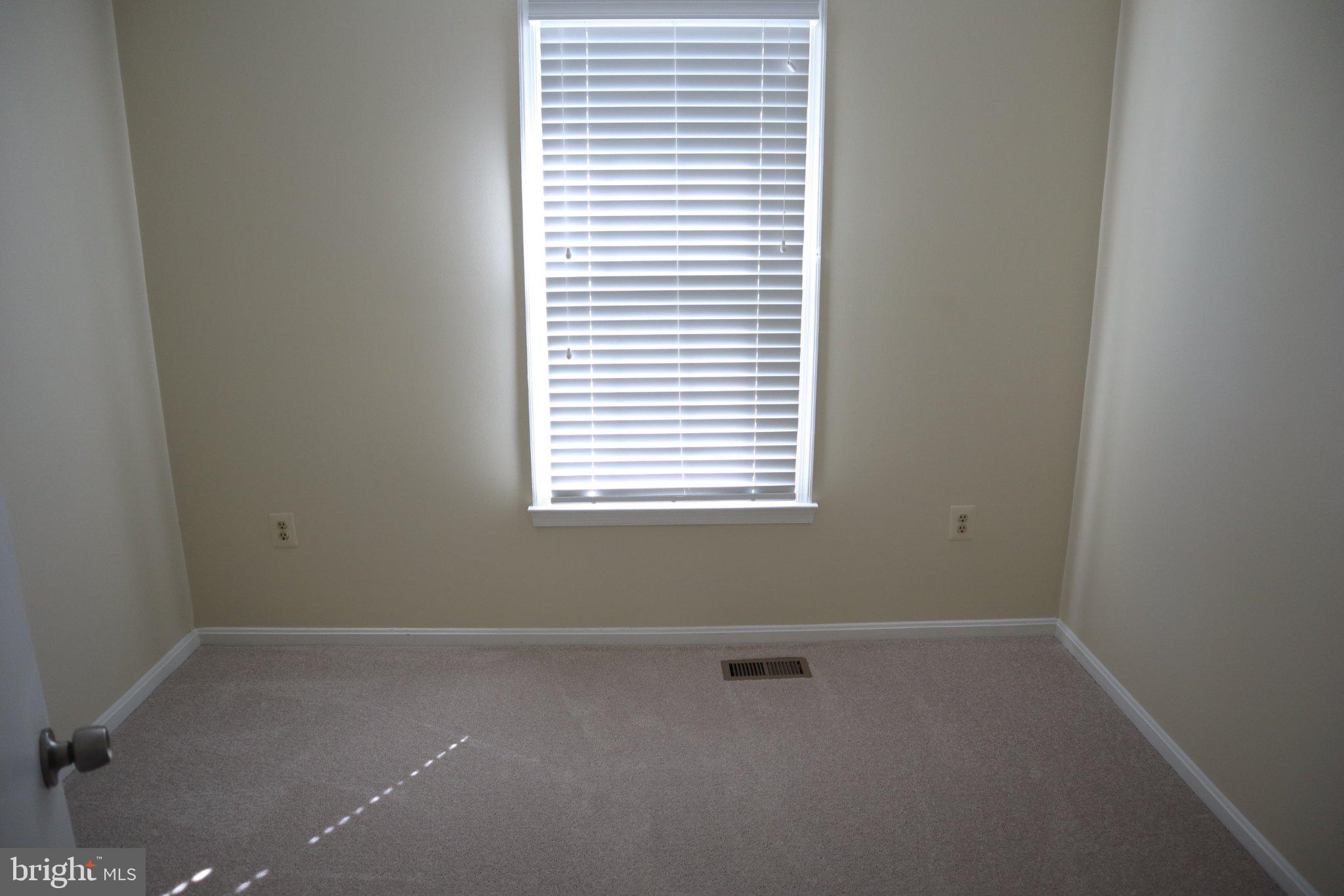 10848 Douglas Avenue Silver Spring, MD 20902 - Photo 19 of 33 an empty room with a window