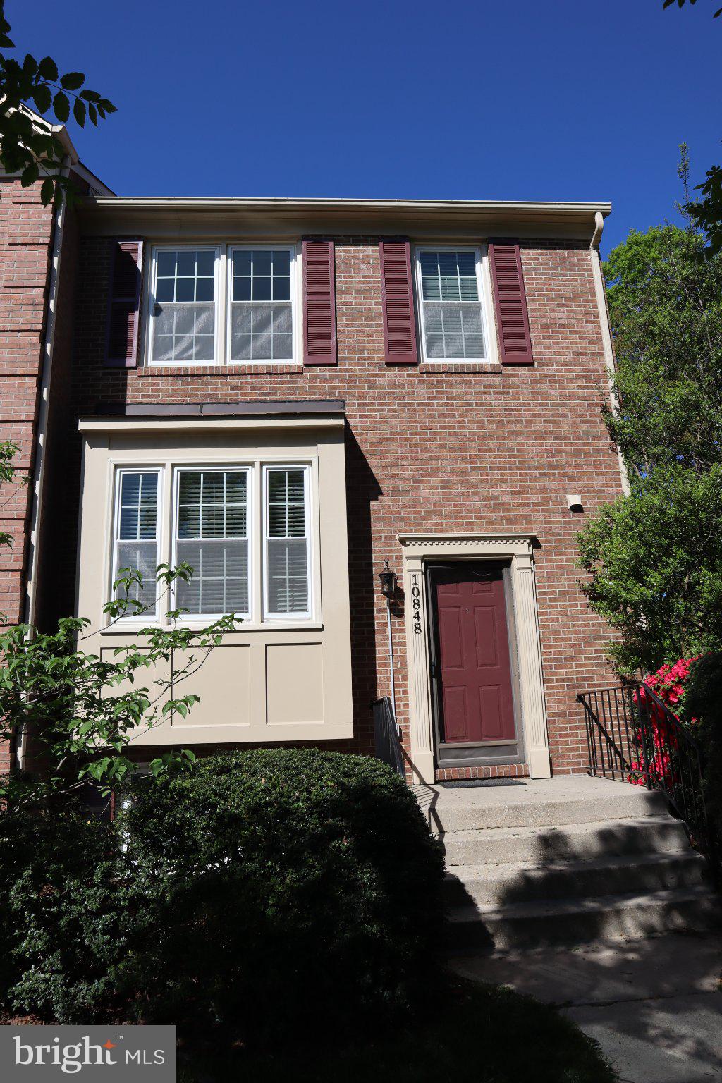 10848 Douglas Avenue Silver Spring, MD 20902 - Photo 2 of 33 a front view of a house with a yard