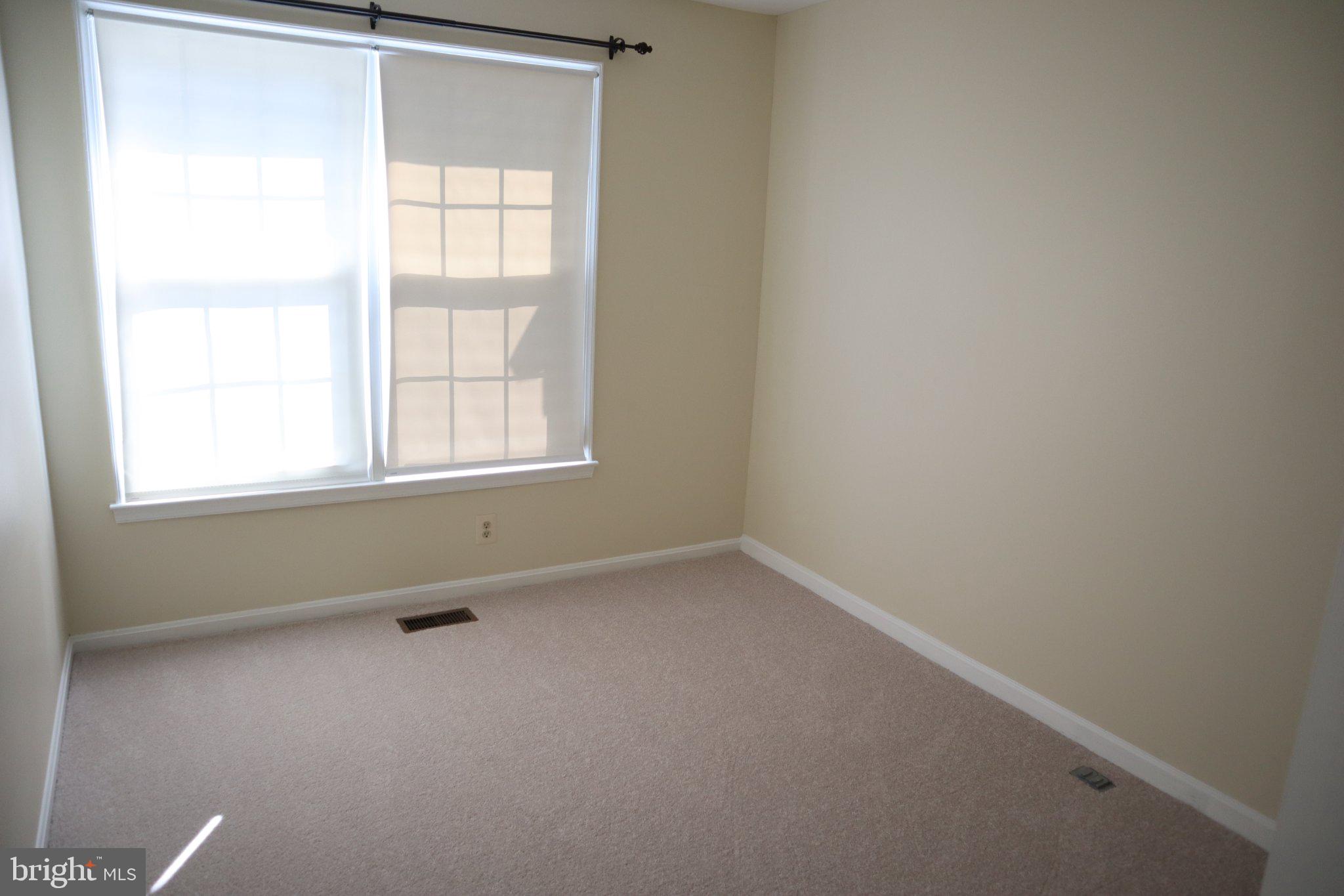 10848 Douglas Avenue Silver Spring, MD 20902 - Photo 22 of 33 an empty room with a window