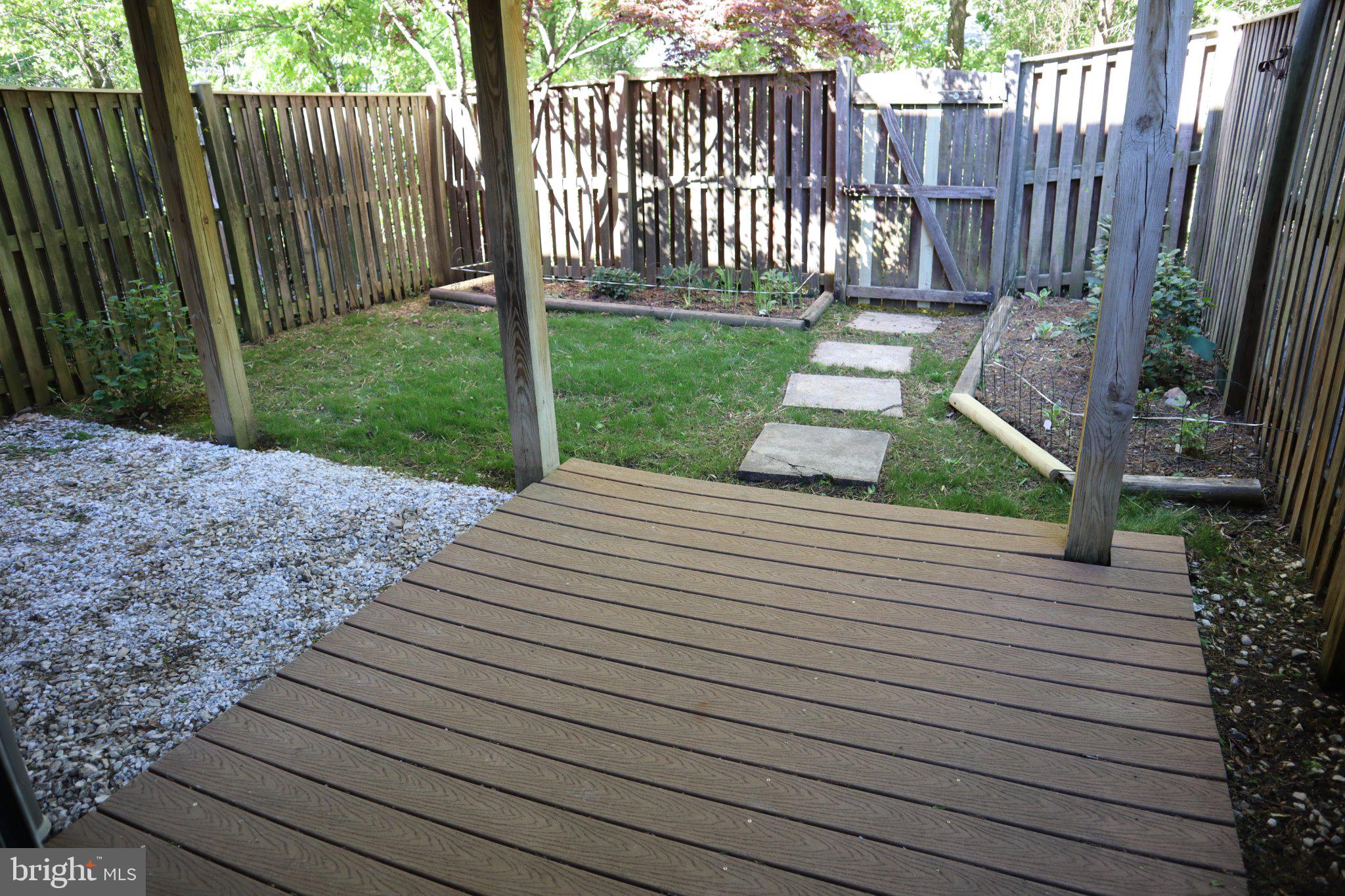10848 Douglas Avenue Silver Spring, MD 20902 - Photo 33 of 33 a view of a backyard with wooden fence