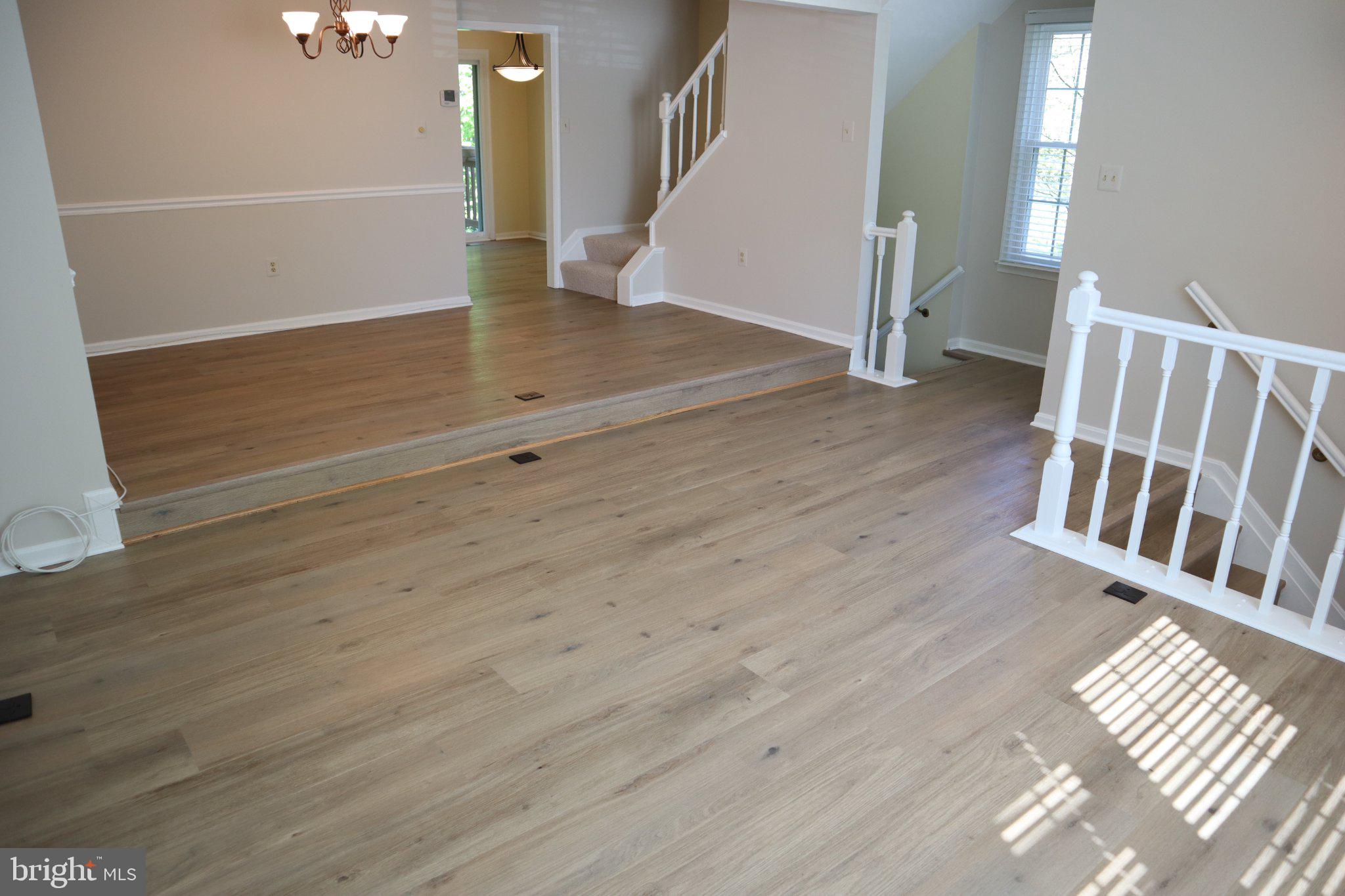10848 Douglas Avenue Silver Spring, MD 20902 - Photo 5 of 33 a view of entryway and hall with wooden floor