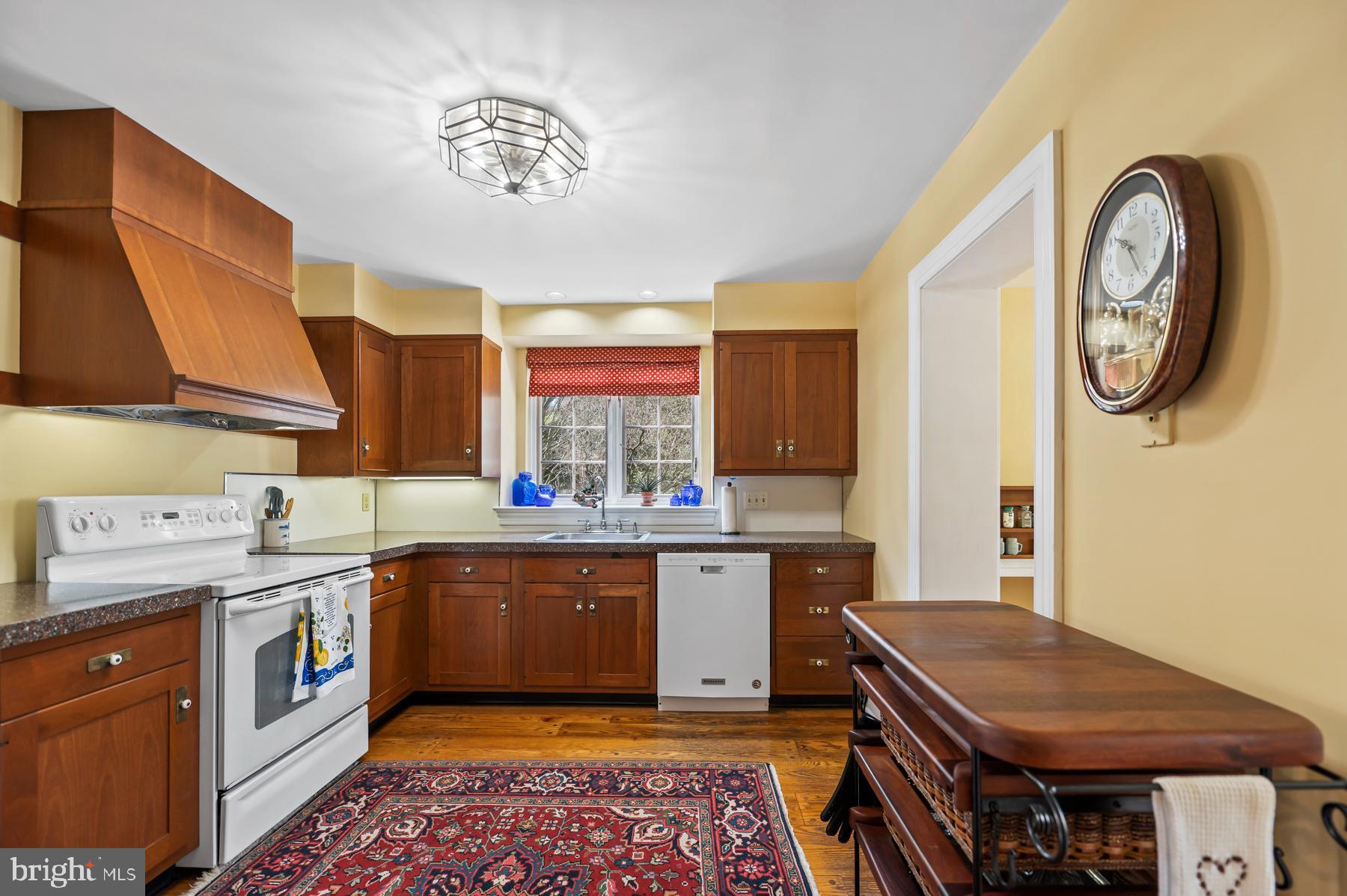 694 Kennedy Road Wayne, PA 19087 - Photo 15 of 39 Cherry custom cabinets