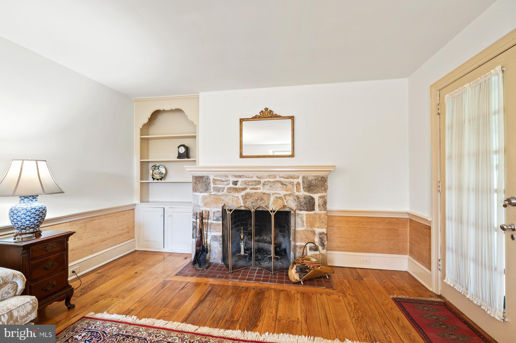 stone fireplace and built ins