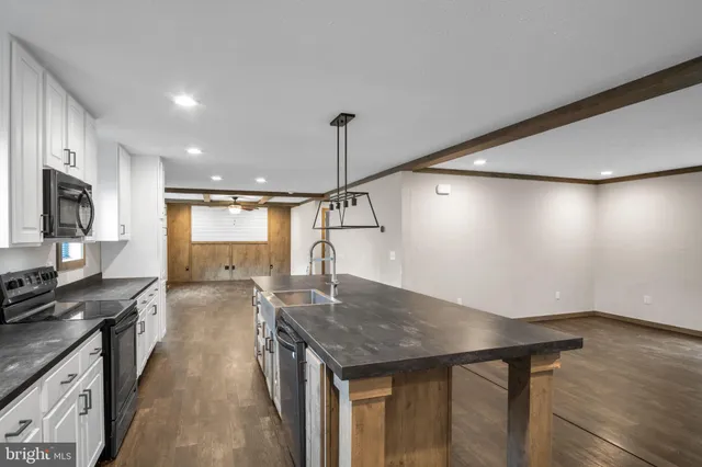 a kitchen with a appliances