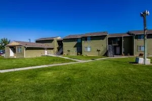 a view of a house with a backyard