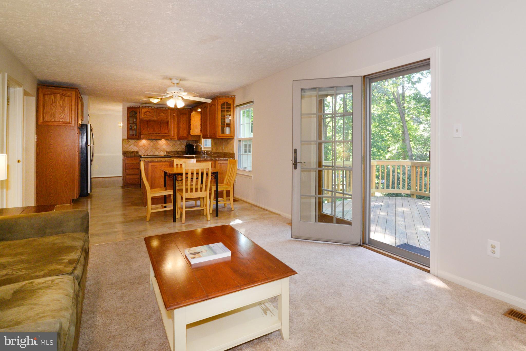 1494 Coat Ridge Road Herndon, VA 20170 - Photo 2 of 37 Main level family room looking into kitchen