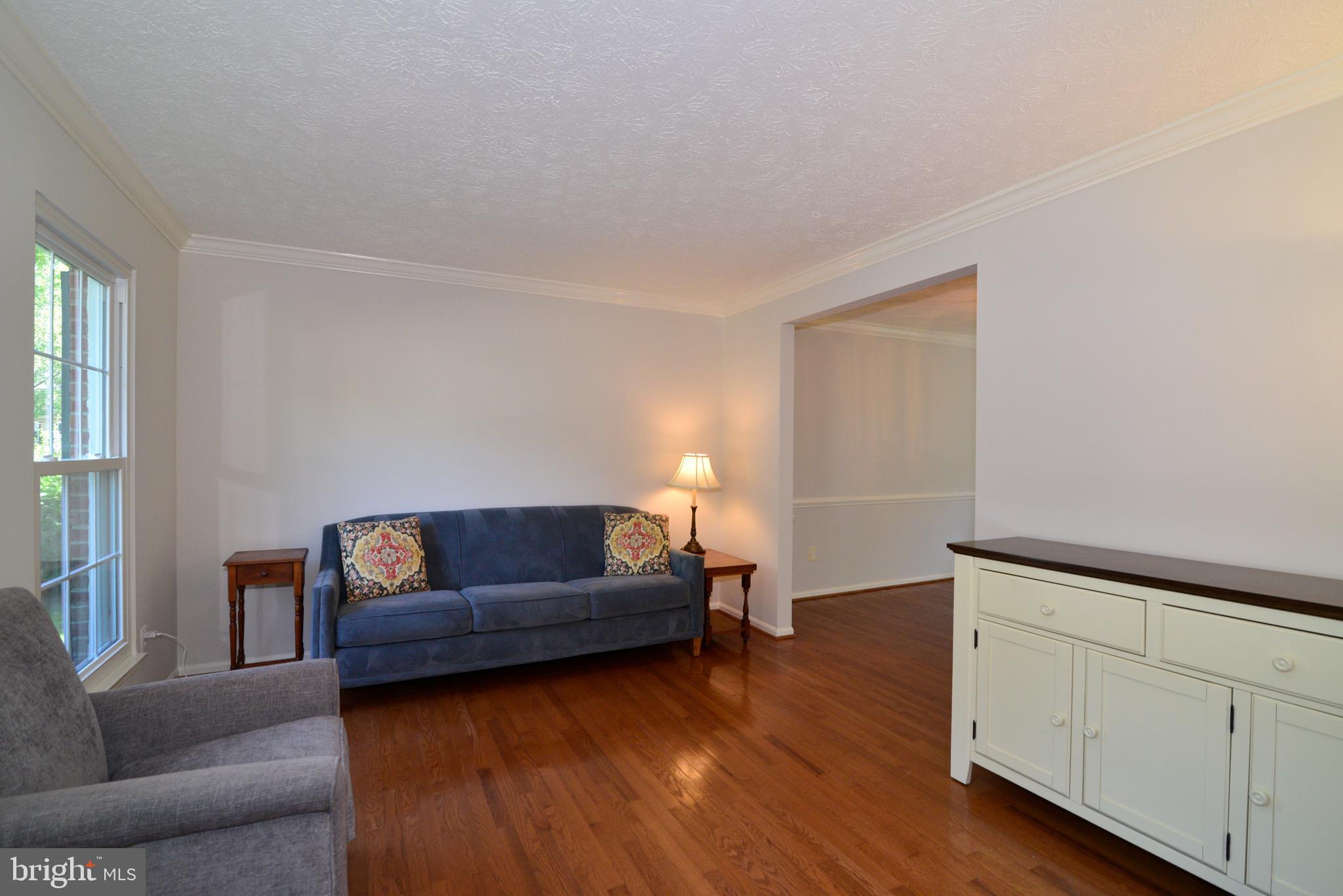 1494 Coat Ridge Road Herndon, VA 20170 - Photo 11 of 37 Living room with hardwood floors