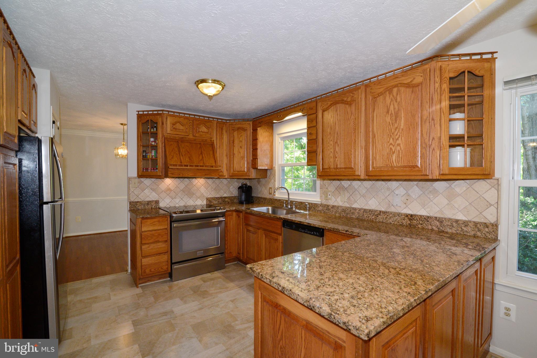 1494 Coat Ridge Road Herndon, VA 20170 - Photo 3 of 37 Kitchen with ample cupboard and counter space
