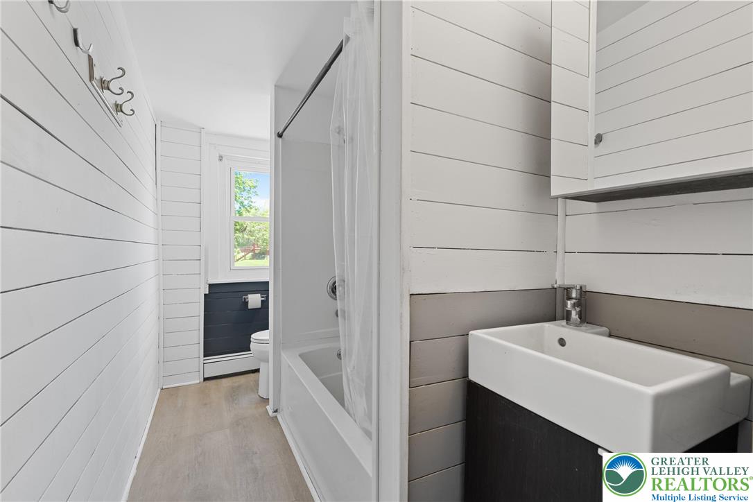 1328 High Street Bethlehem, PA 18018 - Photo 18 of 36 a bathroom with a sink and a mirror
