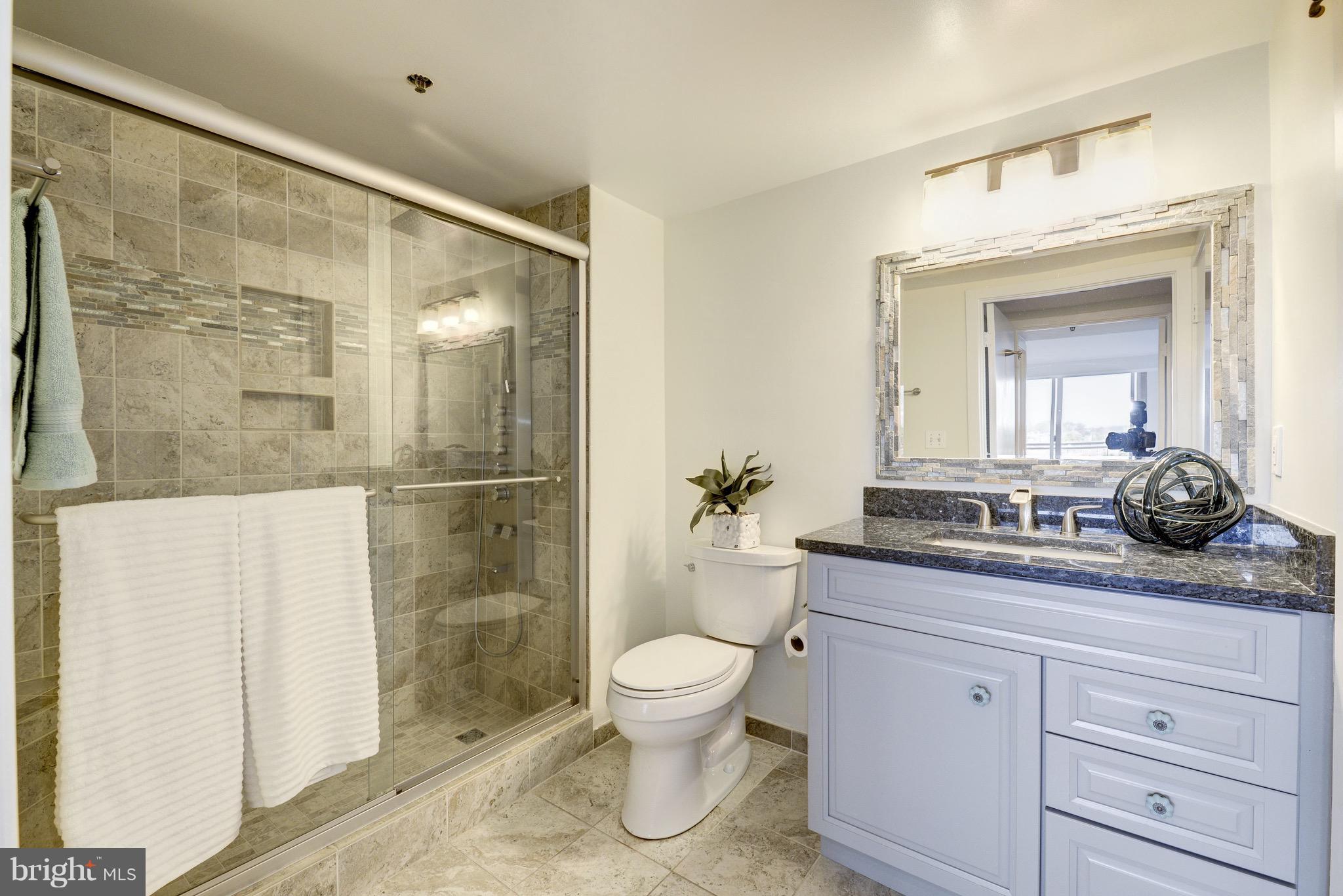 1275 25th Street Northwest, Unit 701 Washington, DC 20037 - Photo 5 of 8 Updated bathroom