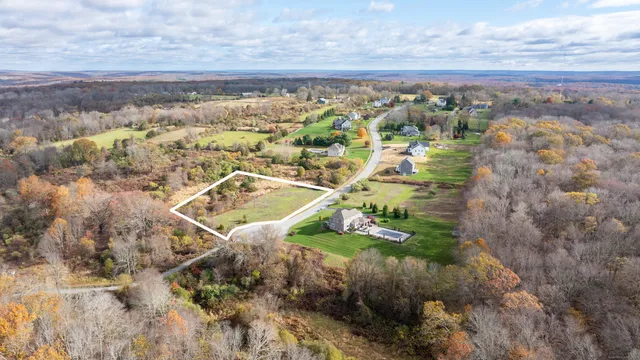 a view of a city with mountains in the background