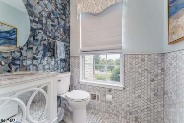 a bathroom with a bathtub sink and toilet