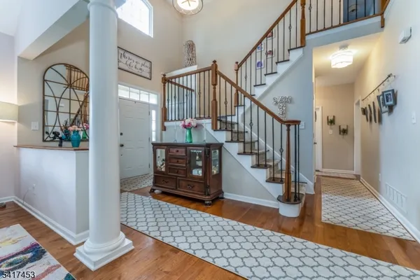 a view of entryway with wooden floor