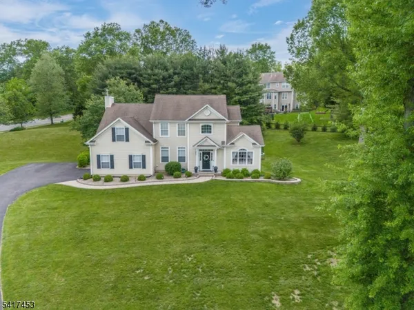a view of a house with a big yard