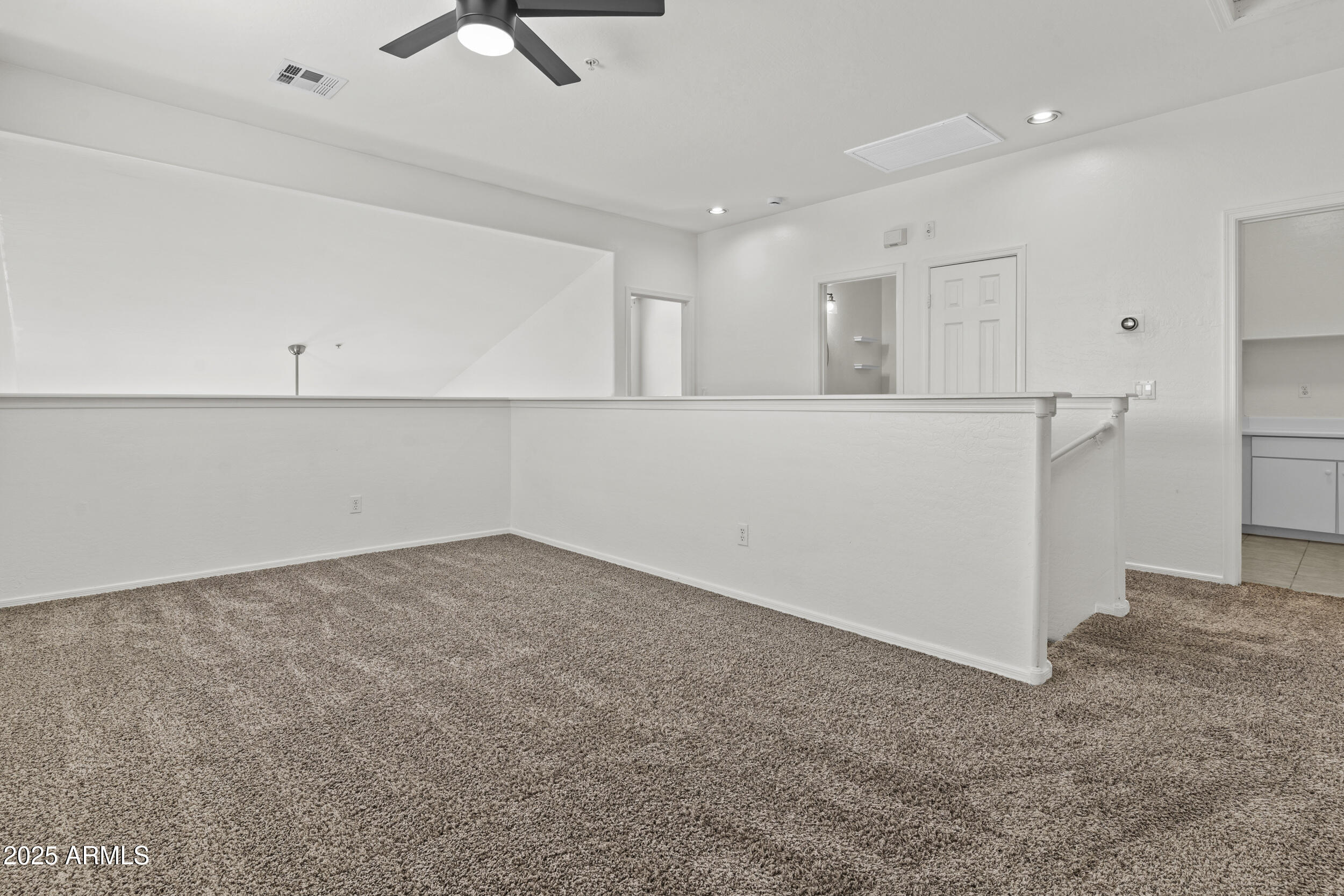 1225 North 36th Street, Unit 1015 Phoenix, AZ 85008 - Photo 12 of 22 a view of an empty room