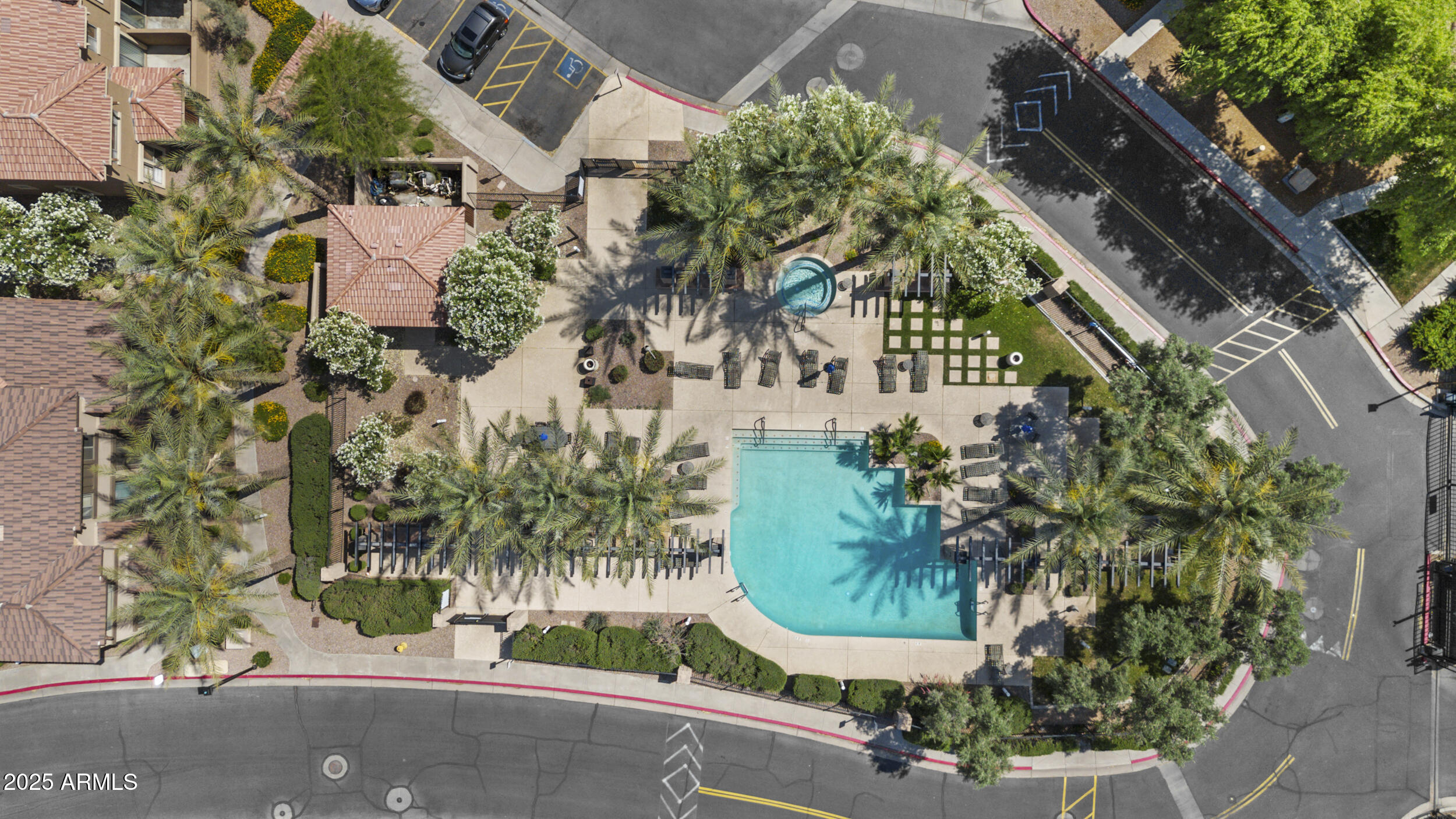 1225 North 36th Street, Unit 1015 Phoenix, AZ 85008 - Photo 20 of 22 an aerial view of a house with yard and swimming pool