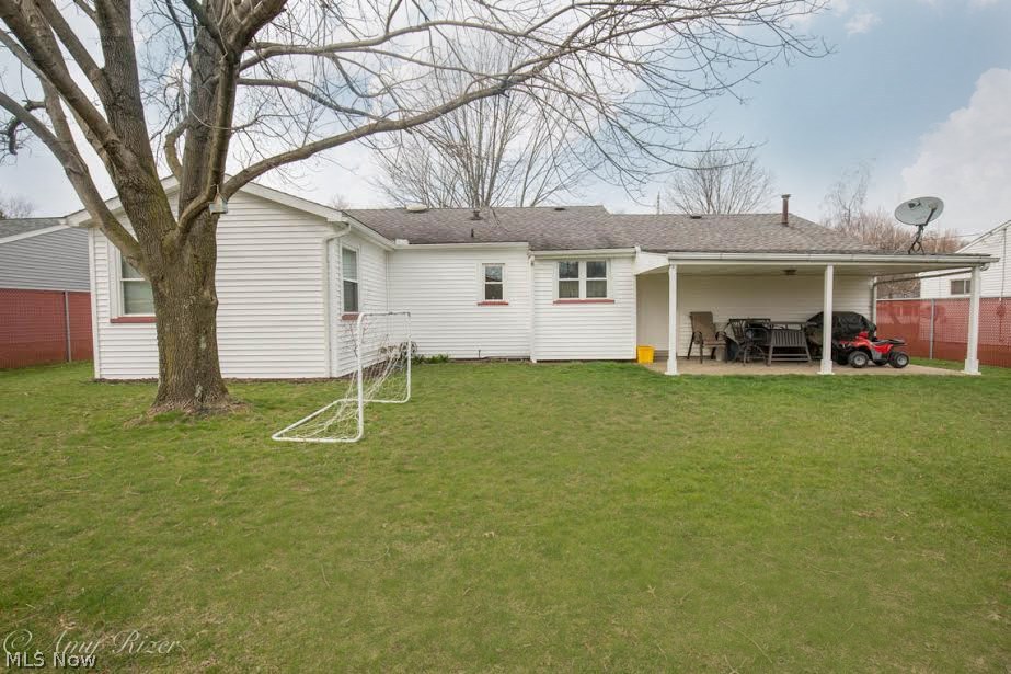 3807 Cannon Road Austintown, OH 44515 - Photo 12 of 13 Covered patio area off the garage and fenced in backyard.