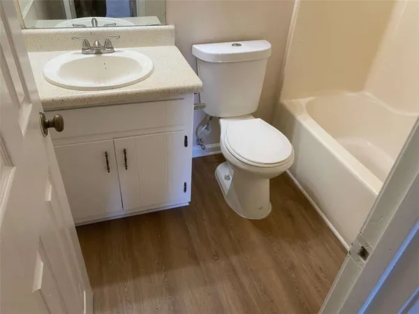 a bathroom with a sink and a toilet