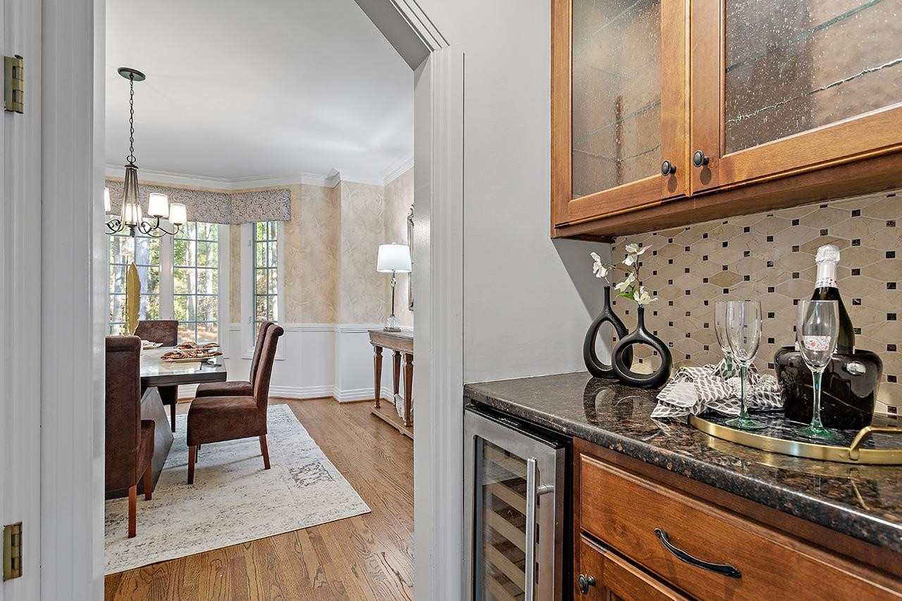 3808 White Chapel Way Raleigh, NC 27615 - Photo 21 of 46 Nice butler's pantry between dining room and kitchen. Wine Cooler!