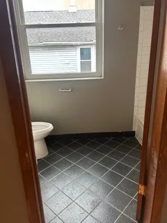a bathroom with a sink and a toilet