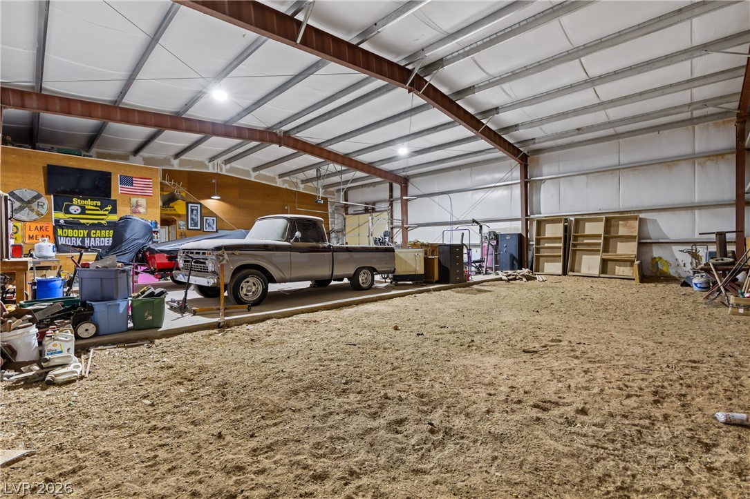 255 Lewis Avenue Overton, NV 89040 - Photo 60 of 94 Dirt barn area in the shop with 2 stall doors