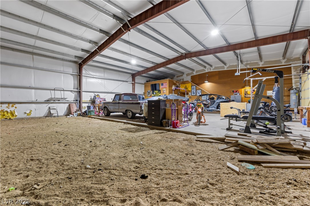 255 Lewis Avenue Overton, NV 89040 - Photo 61 of 94 Dirt barn area in the shop with 2 stall doors