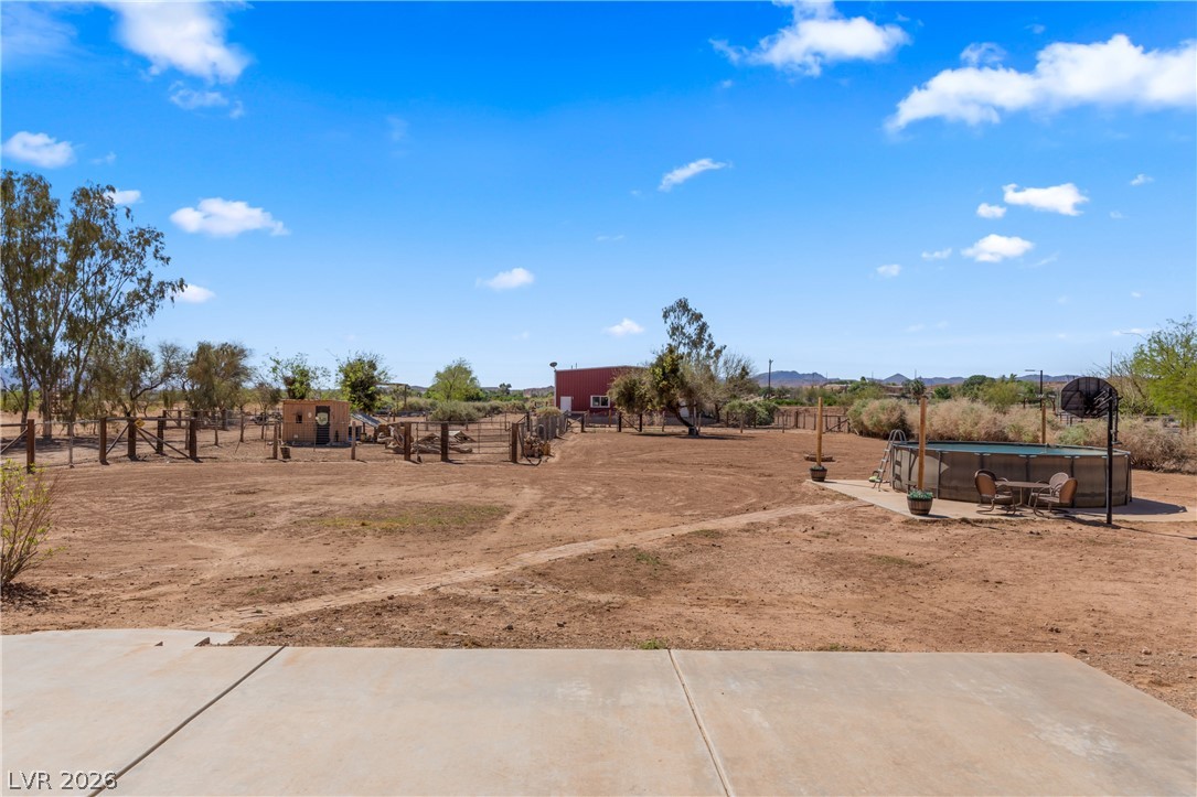 255 Lewis Avenue Overton, NV 89040 - Photo 77 of 94 Chicken coop and above the ground pool stay with the home.