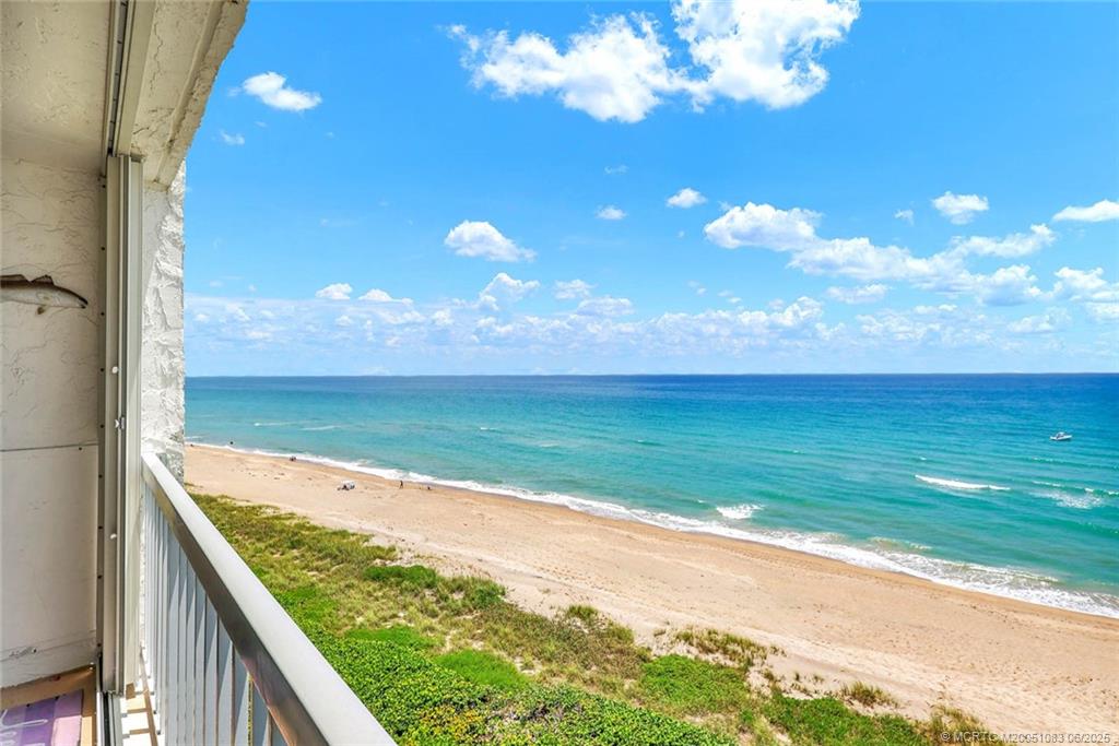 10600 South Ocean Drive, Unit 802 Jensen Beach, FL 34957 - Photo 4 of 39 a view of a balcony with an ocean view