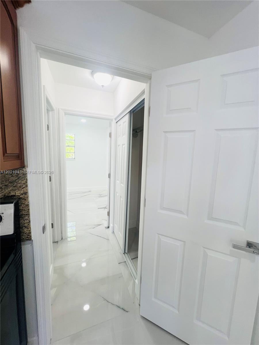 15530 Southwest 295th Terrace Homestead, FL 33033 - Photo 8 of 14 a view of a hallway