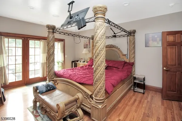 a bed room with a bed and a window