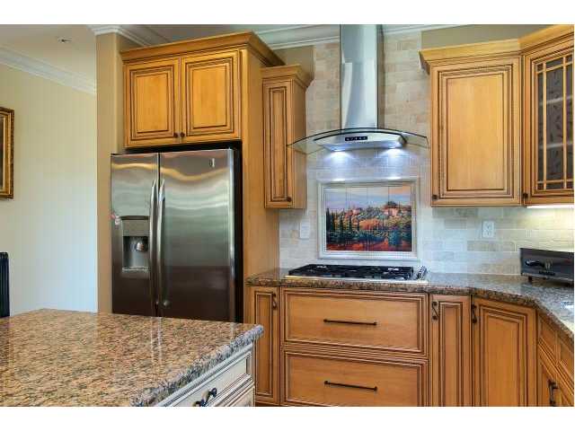 Beautiful and Spacious Kitchen with rich design and touches throughout. SS appliances, full backsplash, large island.