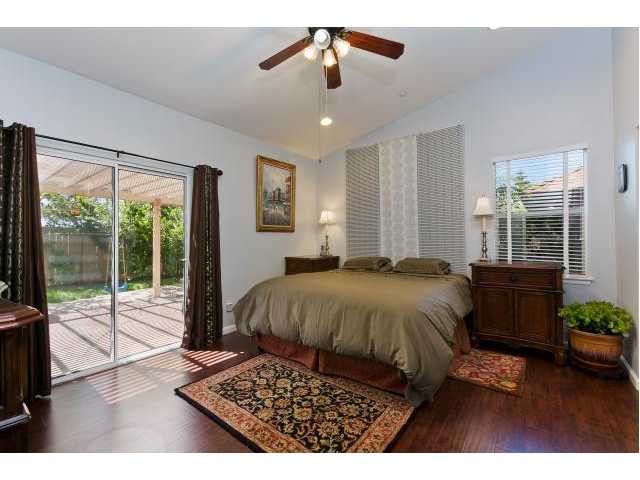 361 Natalie Way Fallbrook, CA 92028 - Photo 25 of 25 Large Master with access to backyard and vaulted ceilings - makes this open floor plan extra roomy and still homey.