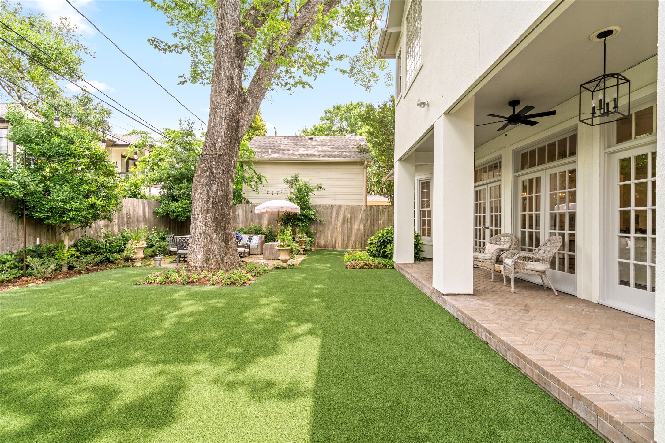4220 Riley Street West University Place, TX 77005 - Photo 34 of 35 Wonderful photo of the newly* installed turfed backyard by Moss Landscping. *2024