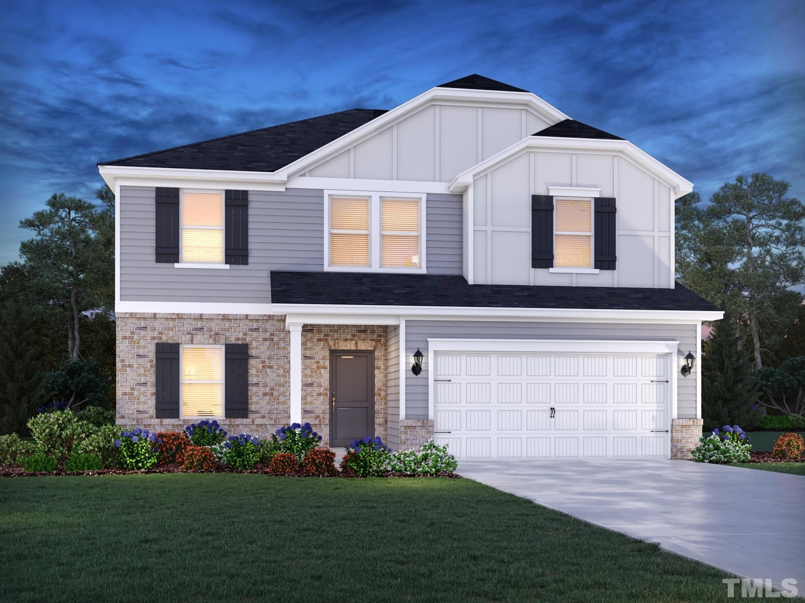 3000 Farndale Trace Durham, NC 27712 - Photo 1 of 14 a front view of a house with a garden and plants