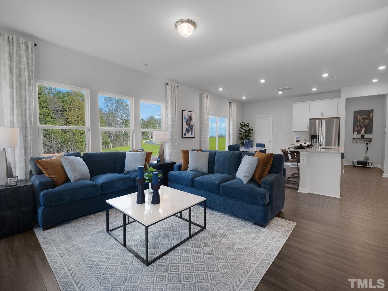 3000 Farndale Trace Durham, NC 27712 - Photo 5 of 14 a living room with furniture and a large window
