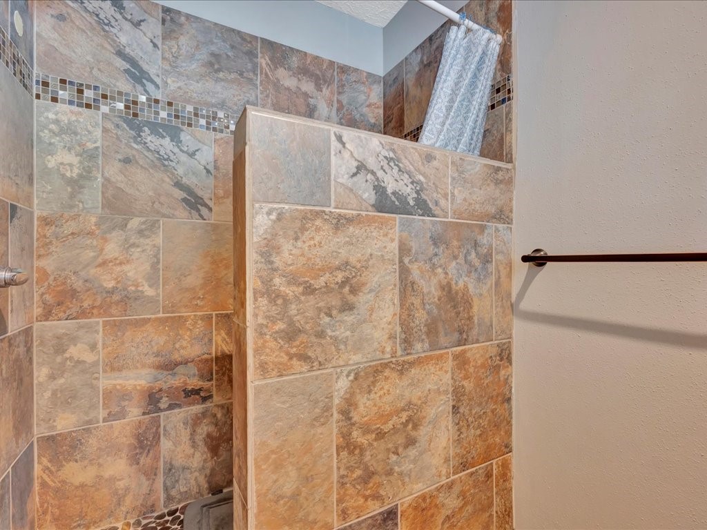 115 Harbor Add Drive Livingston, TX 77351 - Photo 16 of 44 a bathroom with a shower