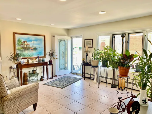 a kitchen with stainless steel appliances a refrigerator sink and cabinets