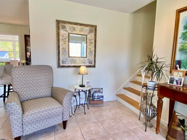 a stove top oven sitting inside of a kitchen
